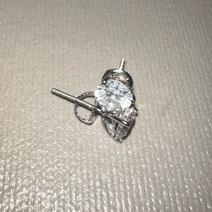 New 14k solid white gold Studs with lab created diamond. About 2ct size